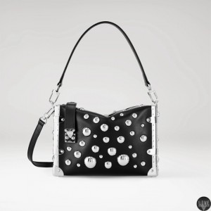 Louis_Vuitton_x_Yayoi_Kusama_Side_Trunk_in_black_taurillon_leather_with_3D_silver-toned_metal_half_spheres.webp